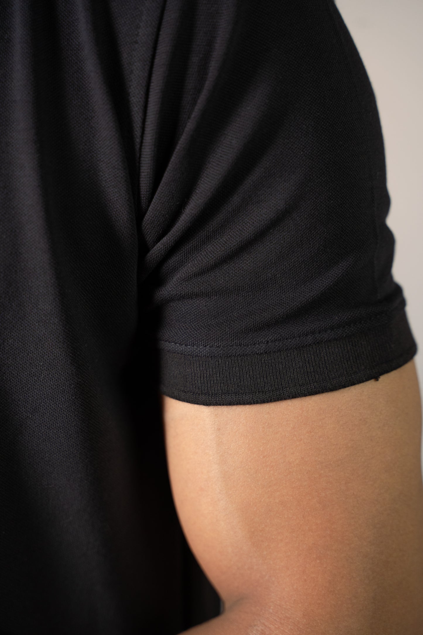 Buttonaire Polo | M Stretch – Obsidian Black